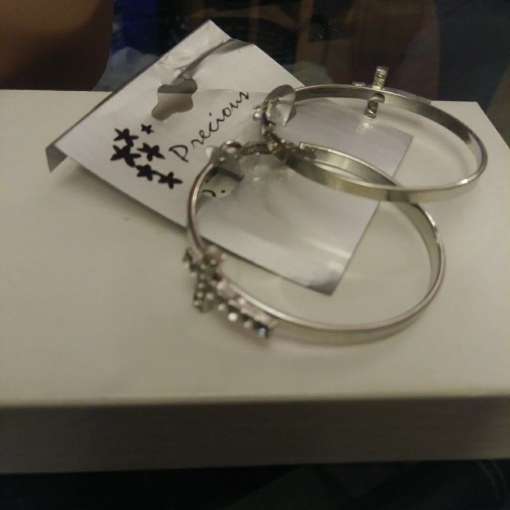 Silver Hoop Earrings with A Cross Embellishment